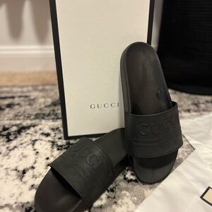 Gucci Black Embossed Logo Rubber Slide Sandals